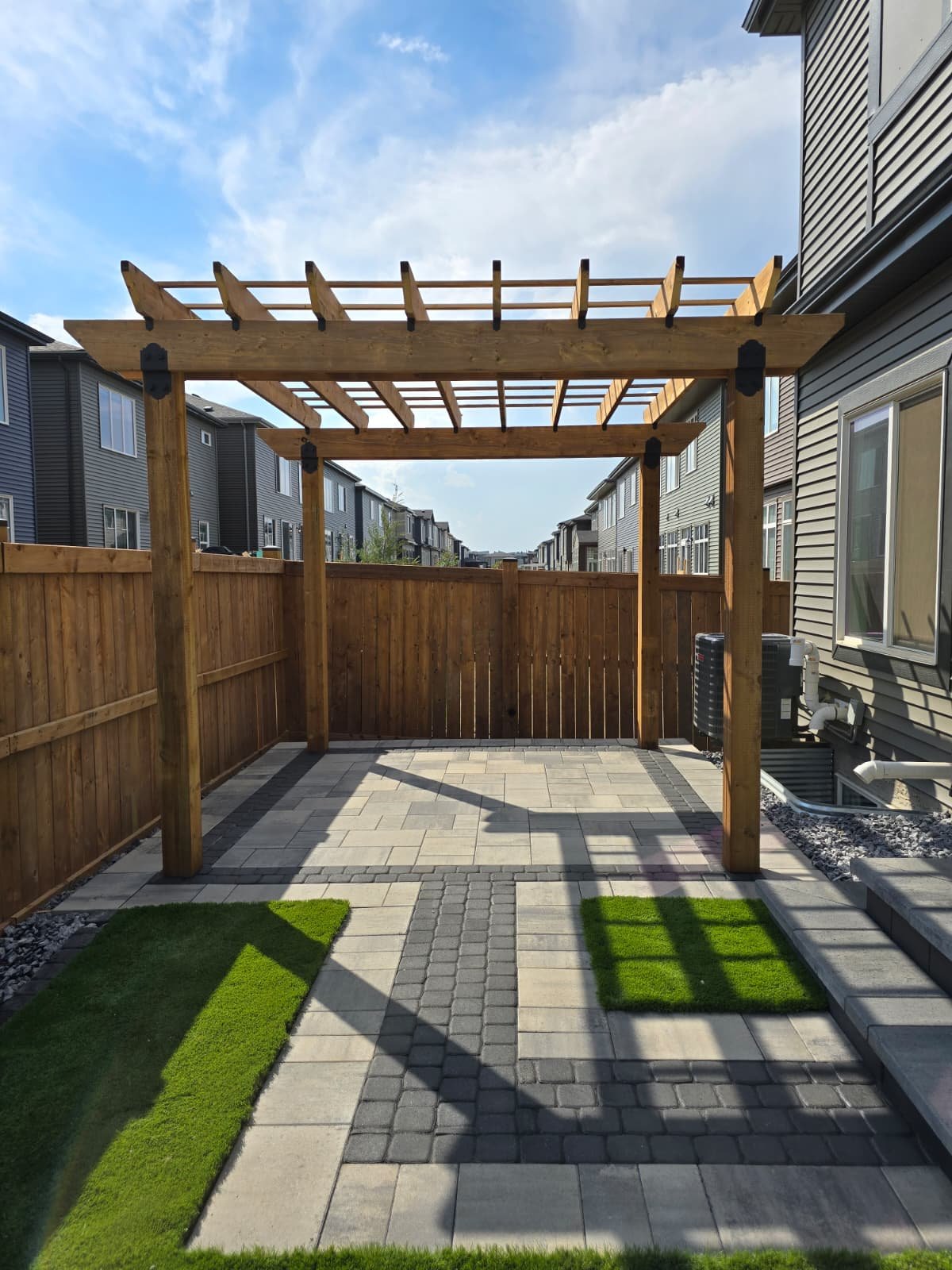 Cedar pergola over paver patio — Windermere Edmonton