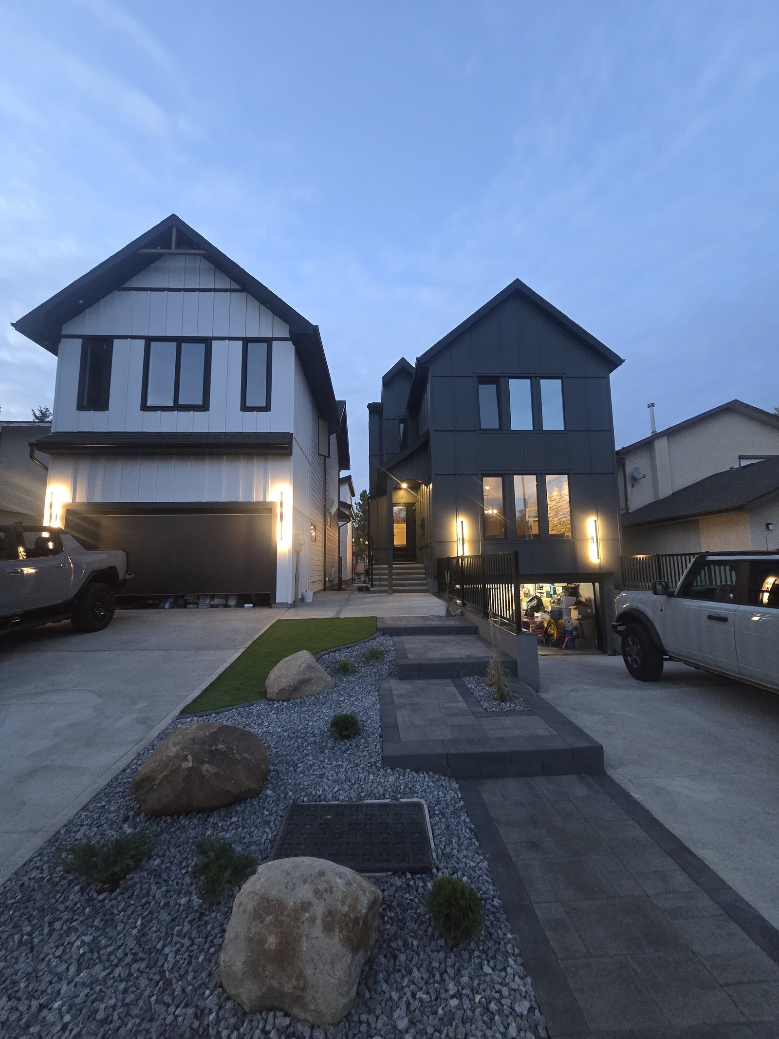 Rockscaping with boulders at dusk — Edmonton